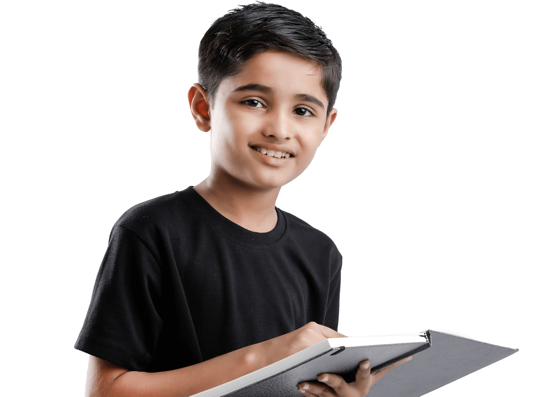 A smiling boy in a black shirt holding an open book.